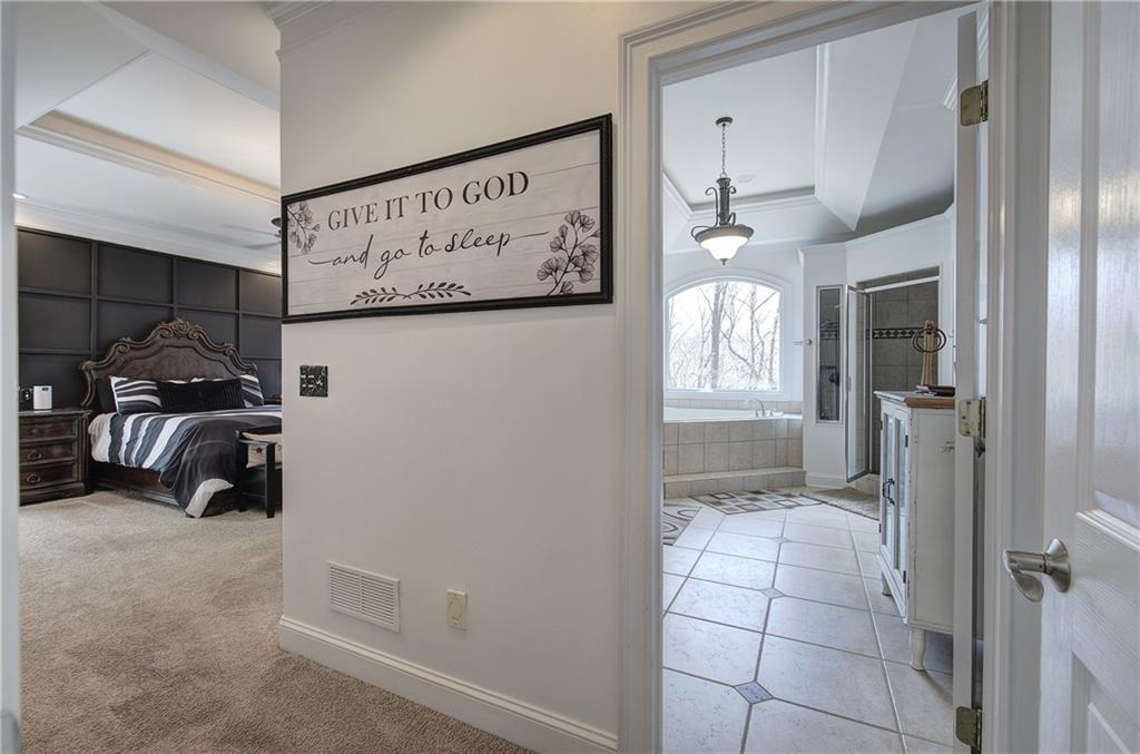64 Fairview Court Jasper, GA 30143 - Photo 32 of 86 a view of a hallway to a livingroom with furniture and windows