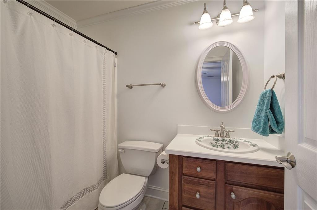 64 Fairview Court Jasper, GA 30143 - Photo 40 of 86 a bathroom with a sink vanity mirror and toilet