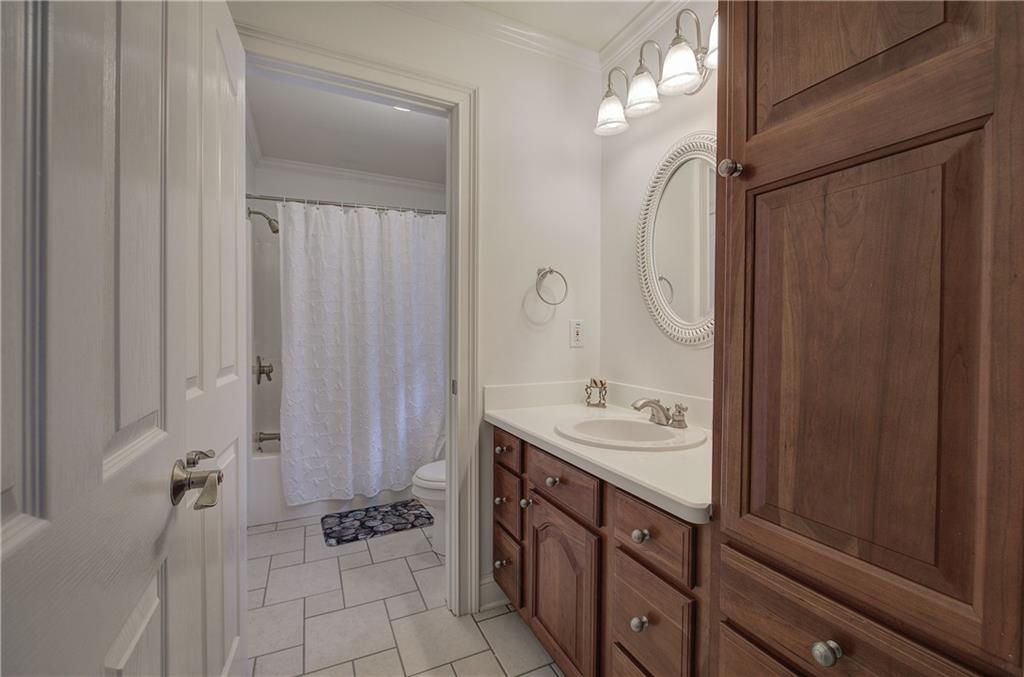 64 Fairview Court Jasper, GA 30143 - Photo 44 of 86 a spacious bathroom with a double vanity sink a mirror and a shower