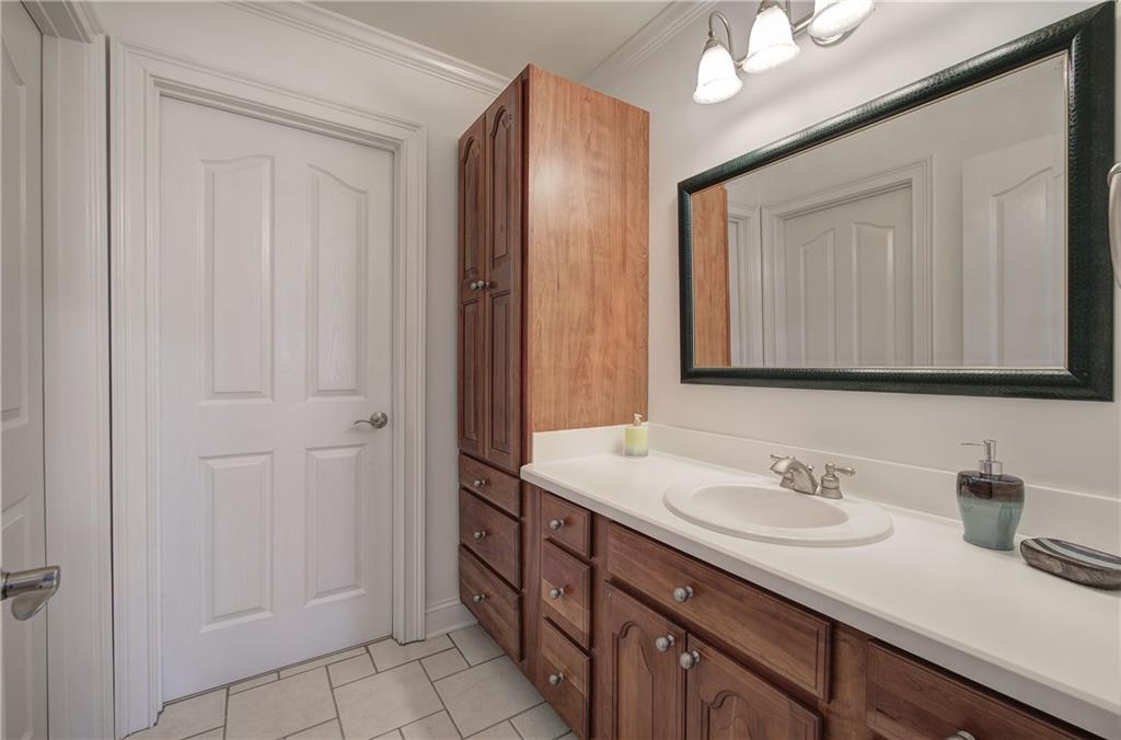 64 Fairview Court Jasper, GA 30143 - Photo 45 of 86 a bathroom with a sink double vanity and a mirror