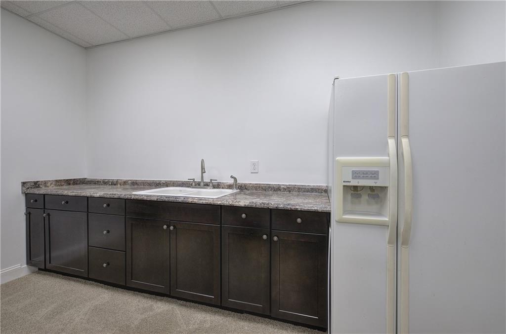 64 Fairview Court Jasper, GA 30143 - Photo 51 of 86 a bathroom with a granite countertop sink and a mirror