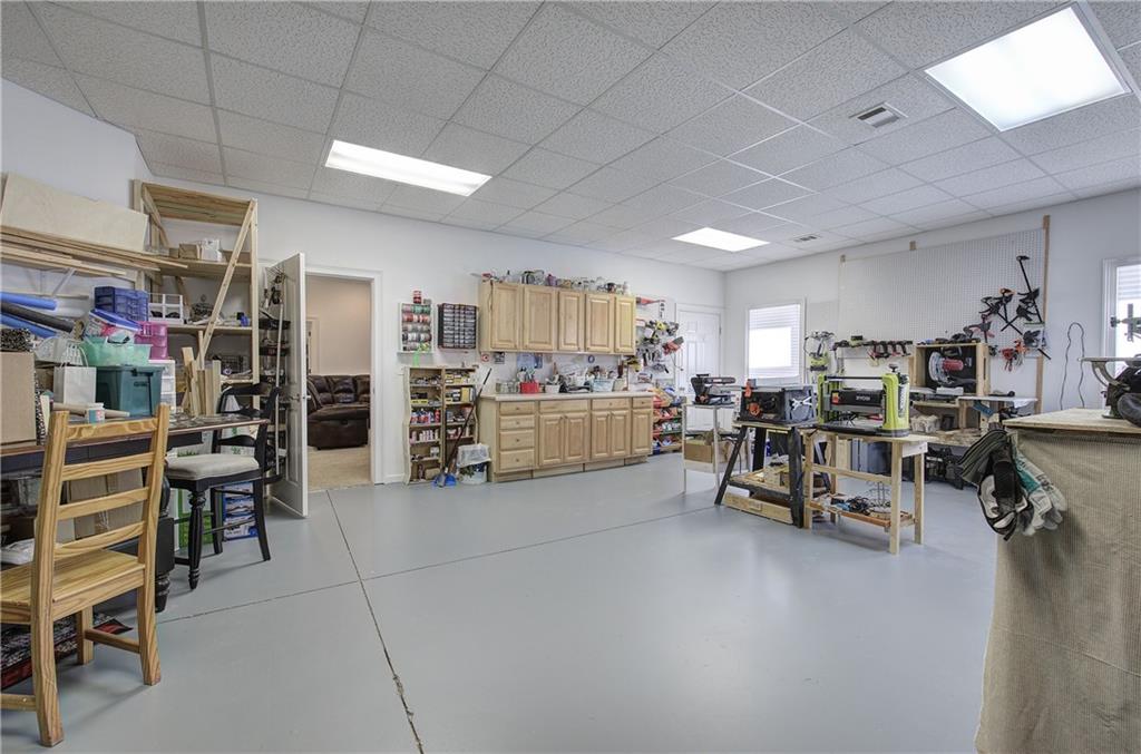 64 Fairview Court Jasper, GA 30143 - Photo 55 of 86 a living room with lots of furniture and a space