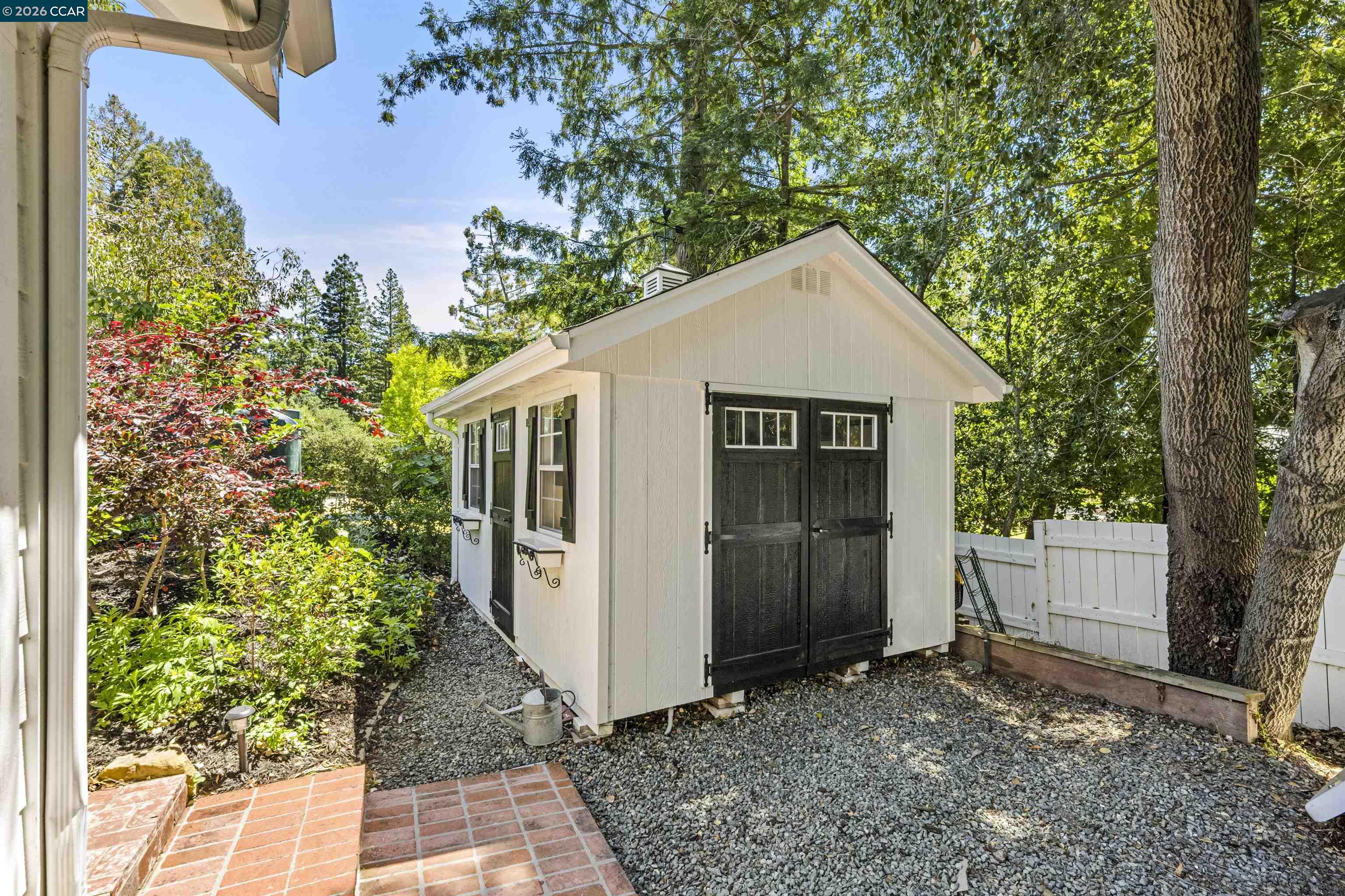 177 Oak Road Alamo, CA 94507 - Photo 68 of 85 a house with trees in the background