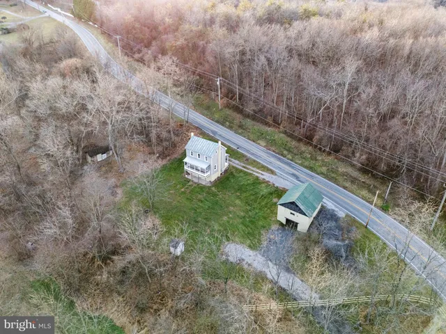 a view of a wooden floor with a yard