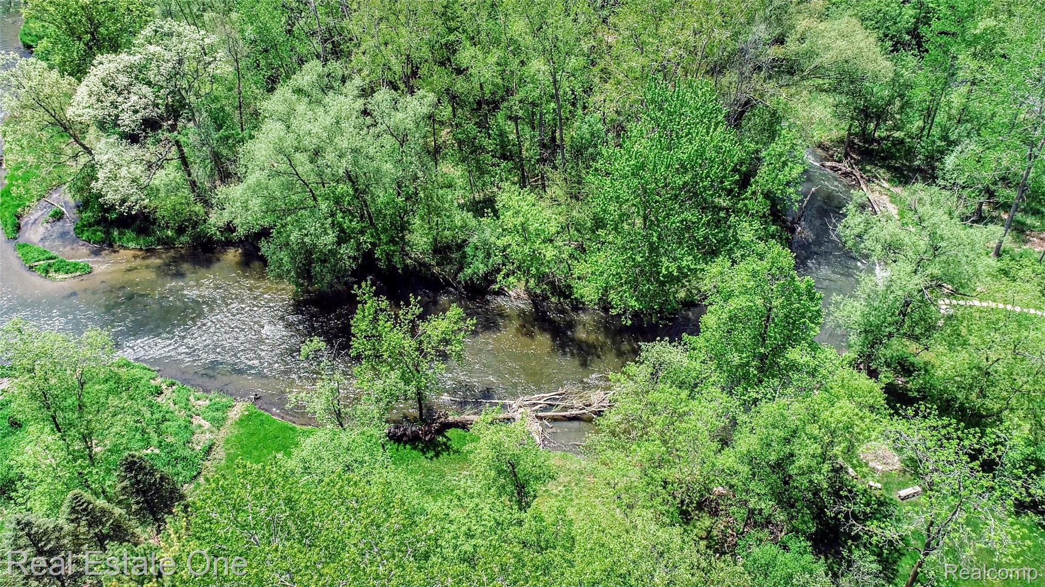 3274 Quail Ridge Circle Rochester, MI 48309 - Photo 6 of 74 Backyard Clinton River aerial view