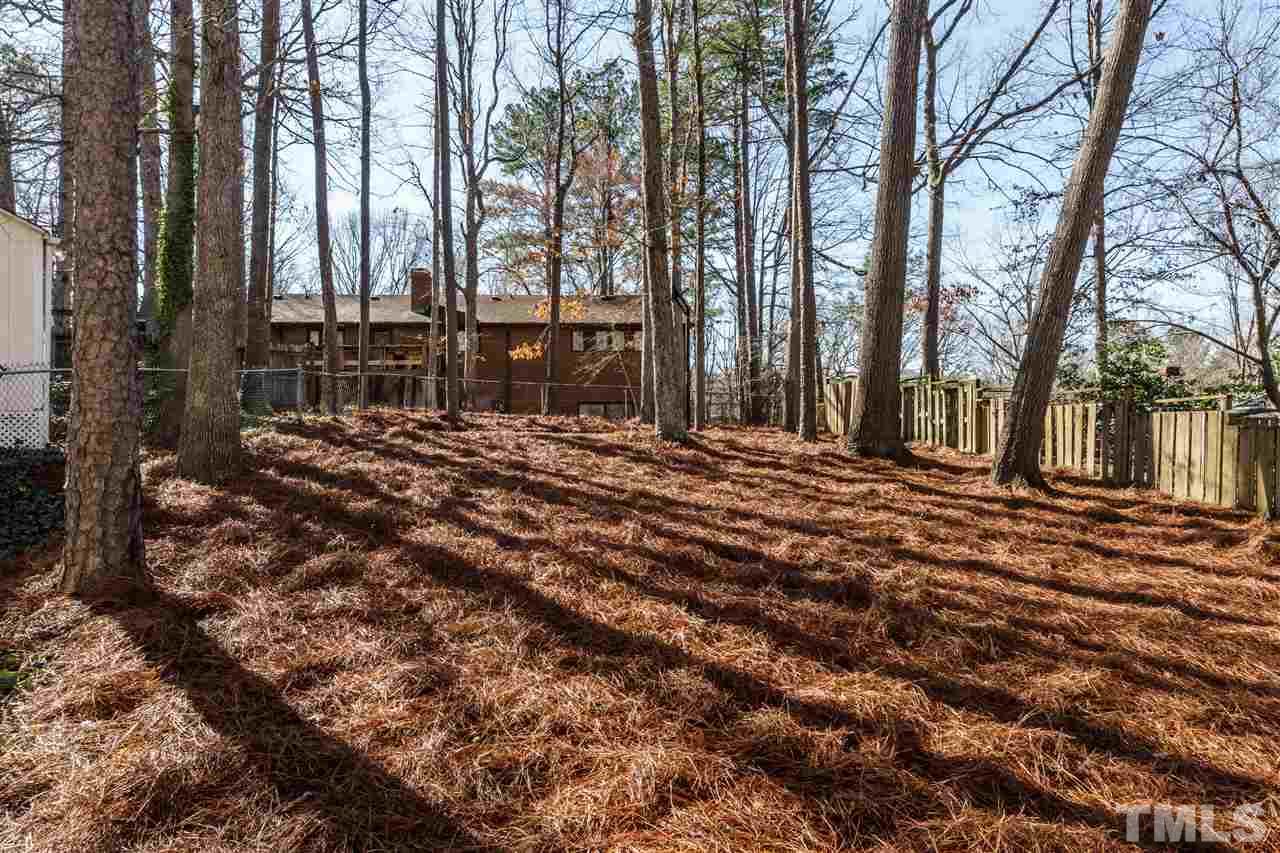 2212 Tyson Street Raleigh, NC 27612 - Photo 22 of 24 a view of a backyard of the house