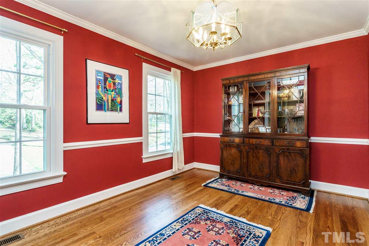 2212 Tyson Street Raleigh, NC 27612 - Photo 4 of 24 a view of a livingroom with furniture window and wooden floor