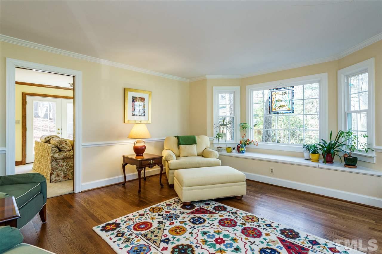 2212 Tyson Street Raleigh, NC 27612 - Photo 5 of 24 a living room with furniture and a rug