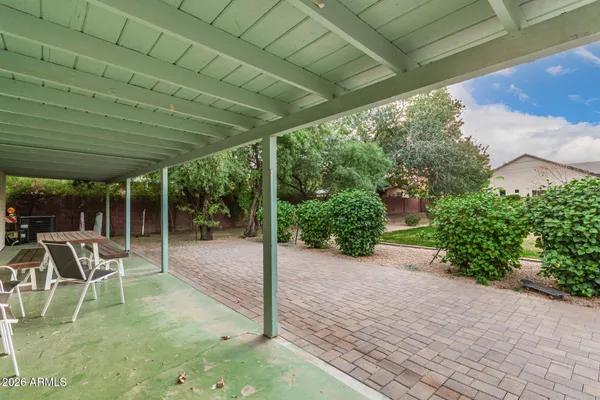 a garden view with a seating space