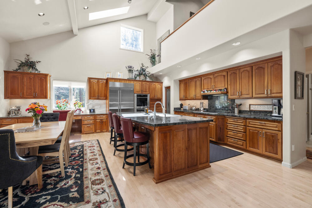 11629 Merganser Road Klamath Falls, OR 97601 - Photo 14 of 50 a large kitchen with lots of counter space and stainless steel appliances