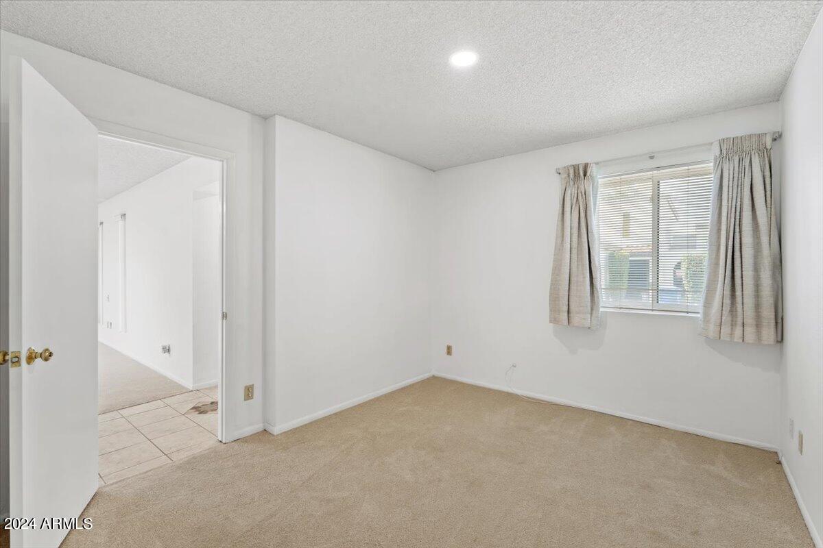 6105 North 12th Way Phoenix, AZ 85014 - Photo 23 of 29 an empty room with windows