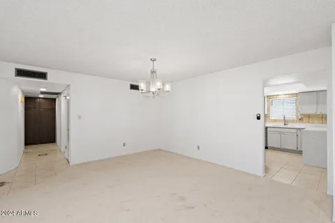 a kitchen with a refrigerator a stove top oven a sink and dishwasher