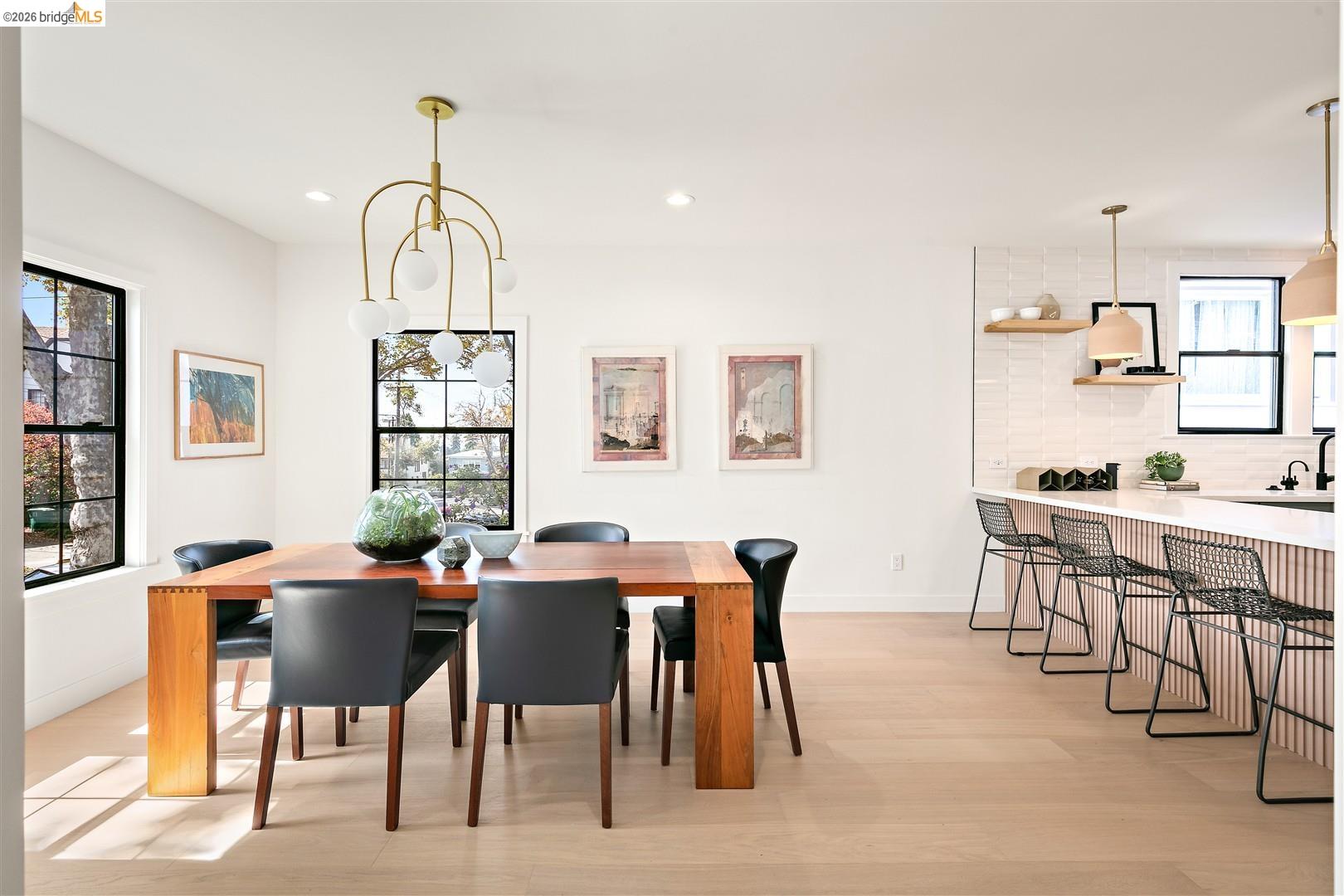 1668 Arch Street Berkeley, CA 94709 - Photo 15 of 78 Hardwood-style flooring extends throughout, complemented by a modern chandelier and recessed lighting
