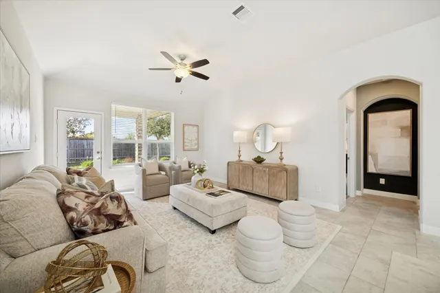 a kitchen with appliances cabinets and furniture