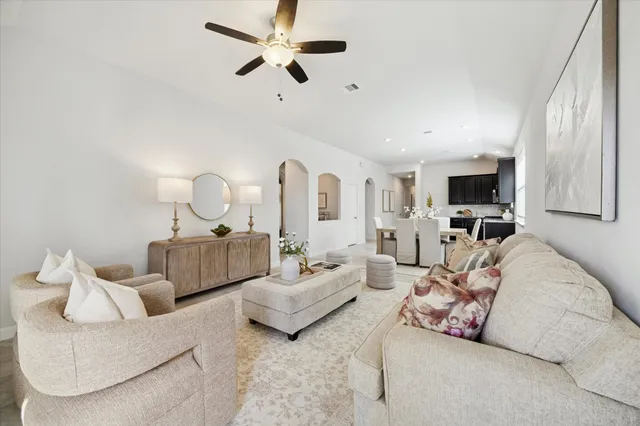 a living room with furniture or couch and a flat screen tv