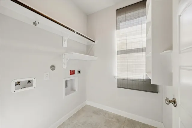a bathroom with a granite countertop sink a toilet a mirror and shower