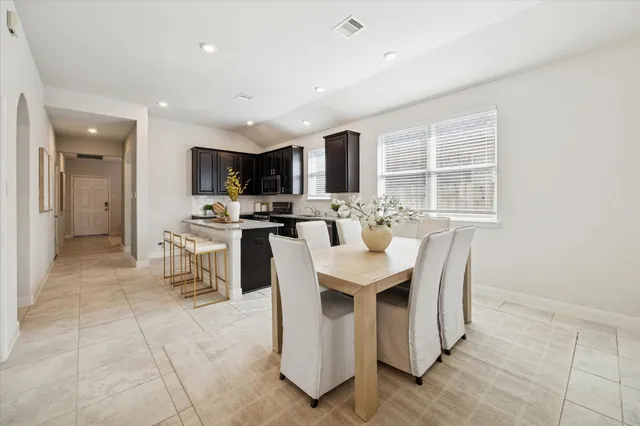 a view of a dining room with furniture
