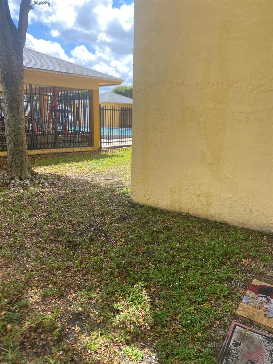 11800 Southwest 18th Street, Unit 1084 Miami, FL 33175 - Photo 29 of 30 a view of a large yard