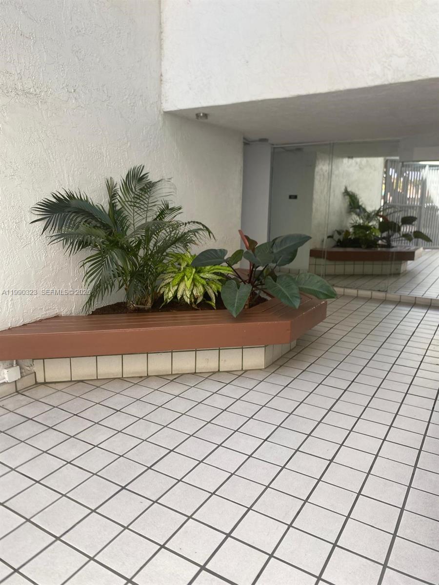 11800 Southwest 18th Street, Unit 1084 Miami, FL 33175 - Photo 5 of 30 a view of a car garage