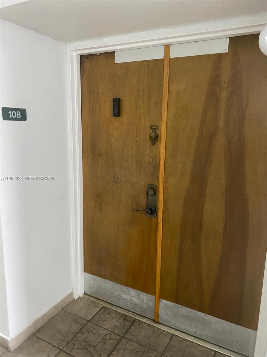 11800 Southwest 18th Street, Unit 1084 Miami, FL 33175 - Photo 8 of 30 a bathroom with a shower and a sink