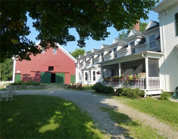 394 Littlefield Road Boxborough, MA 01719 - Photo 20 of 21 a front view of a house with a yard