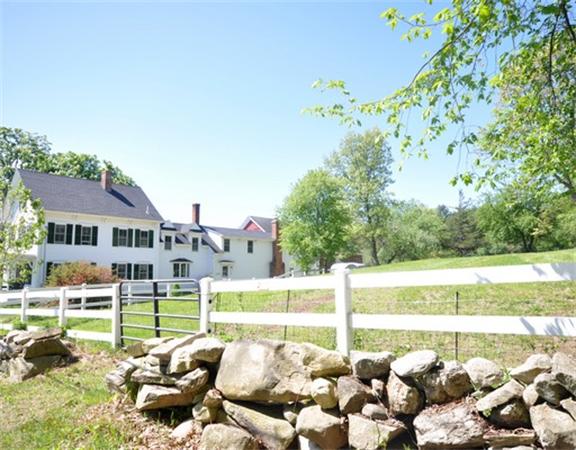 394 Littlefield Road Boxborough, MA 01719 - Photo 2 of 21 a front view of a house with garden