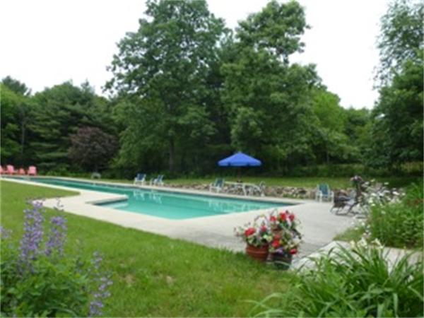 394 Littlefield Road Boxborough, MA 01719 - Photo 21 of 21 a garden view with a sitting space