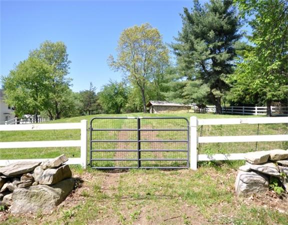 394 Littlefield Road Boxborough, MA 01719 - Photo 3 of 21 a view of a garden with an outdoor space