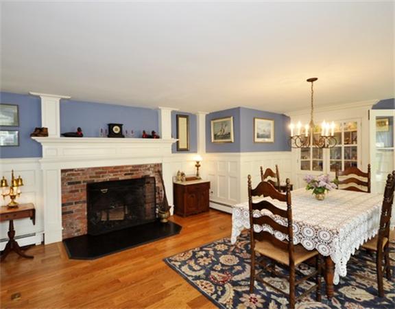 394 Littlefield Road Boxborough, MA 01719 - Photo 7 of 21 a living room with furniture and a fireplace