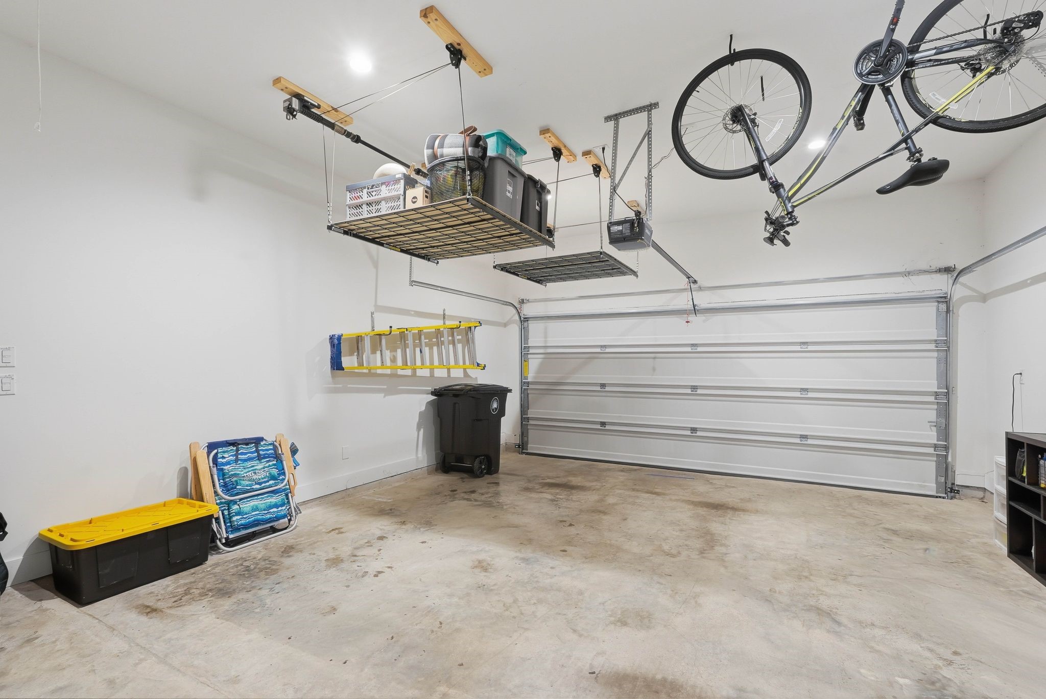 17907 Purple Amaranth Conroe, TX 77385 - Photo 20 of 24 Lift racks in the garage, so convenient!