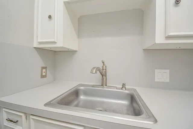 a close view of a sink and tap