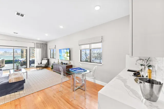 a living room with furniture and a table