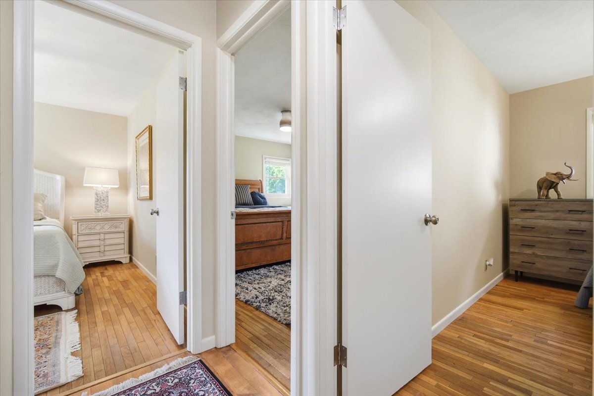 203 Highview Drive Eureka, IL 61530 - Photo 14 of 49 a view of a hallway with bathroom and wooden floor