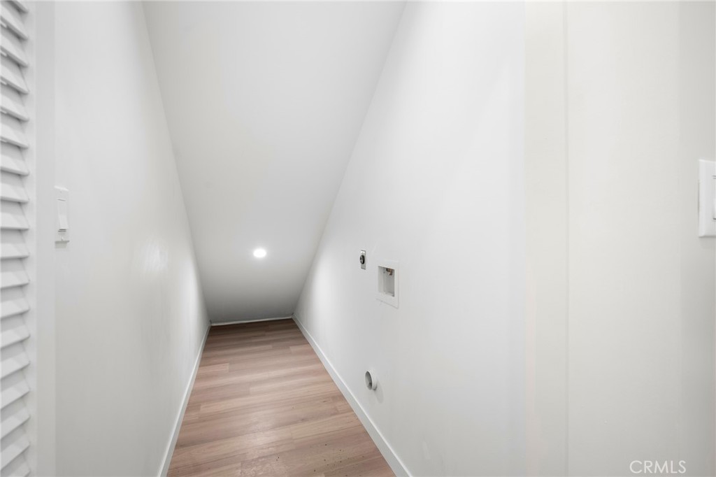 8435 Rincon Avenue Sun Valley, CA 91352 - Photo 56 of 61 a view of a hallway with wooden floor