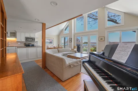 a living room with furniture and a table
