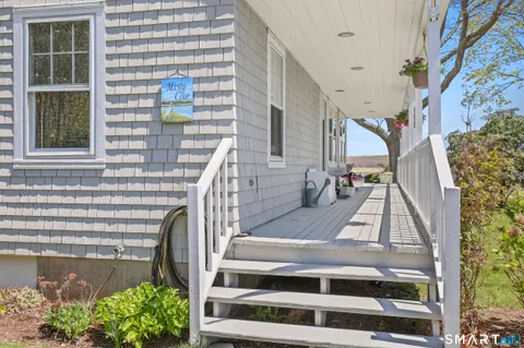 a view of entryway with a front door