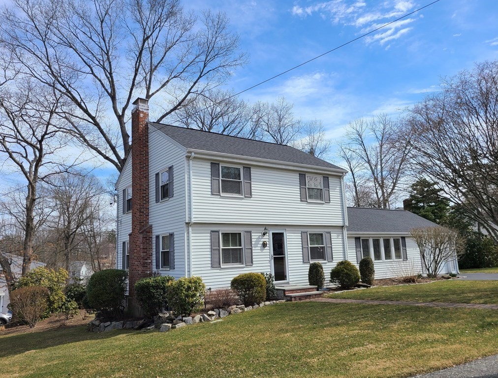 1 Lexington Circle Canton, MA 02021 - Photo 1 of 41 a front view of a house with garden