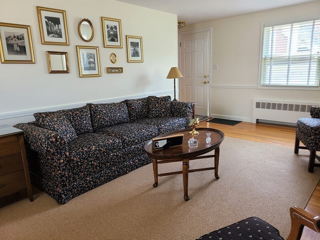 1 Lexington Circle Canton, MA 02021 - Photo 18 of 41 a living room with furniture a couch and a window