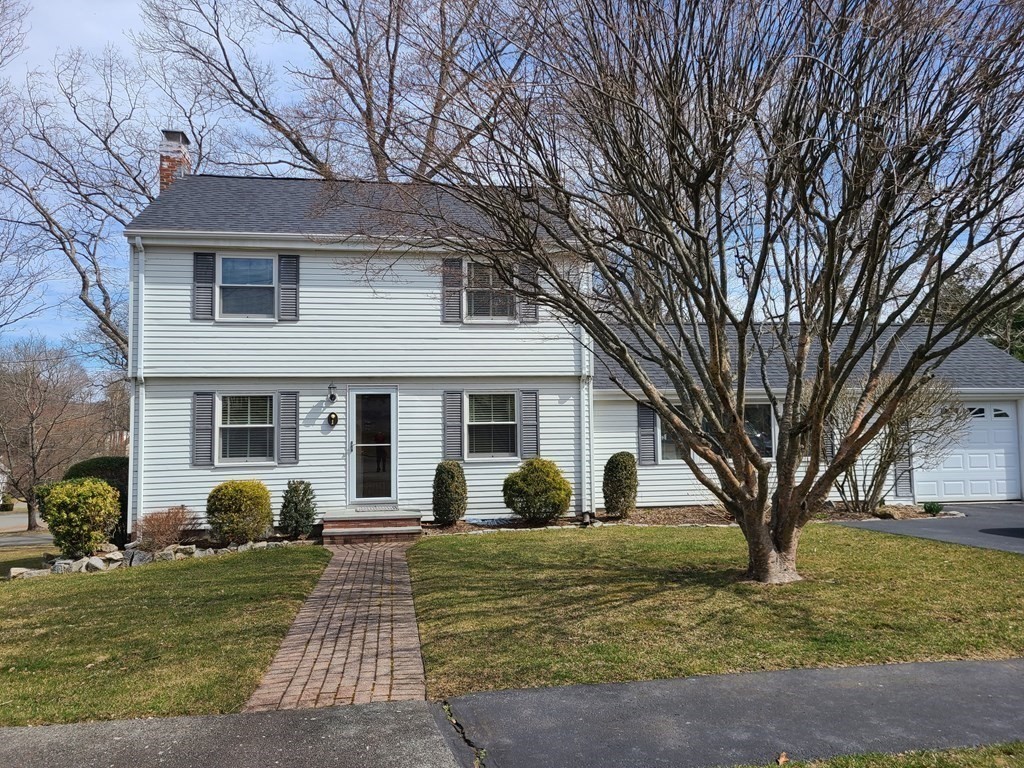 1 Lexington Circle Canton, MA 02021 - Photo 2 of 41 a view of a white house with a large windows and large trees