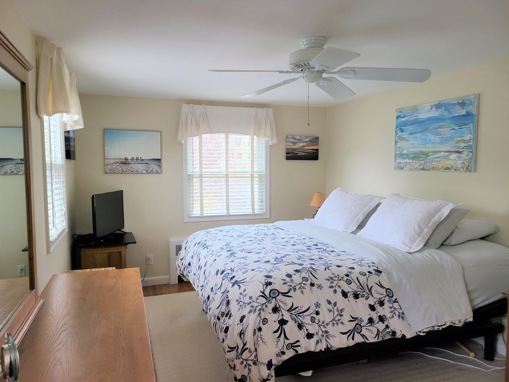1 Lexington Circle Canton, MA 02021 - Photo 22 of 41 a bedroom with a bed and a window