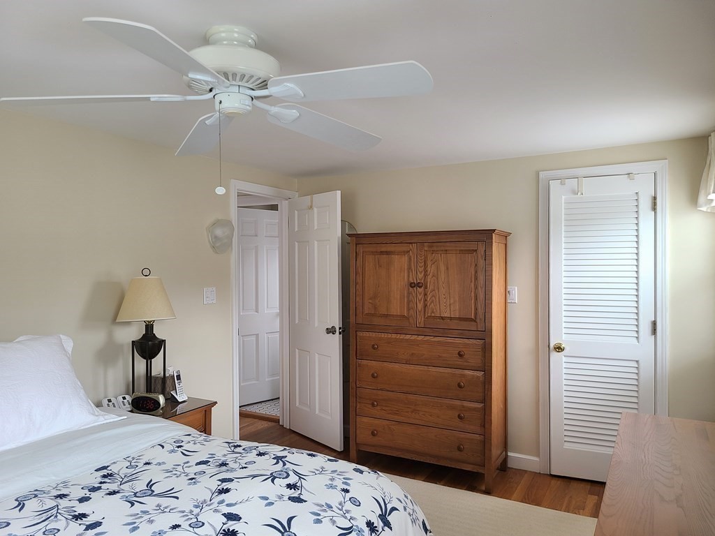 1 Lexington Circle Canton, MA 02021 - Photo 23 of 41 a bedroom with a bed and a dresser in it