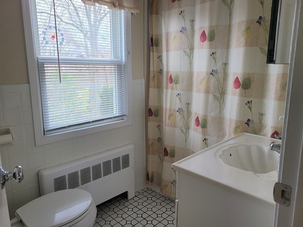 1 Lexington Circle Canton, MA 02021 - Photo 29 of 41 a bathroom with a sink and toilet
