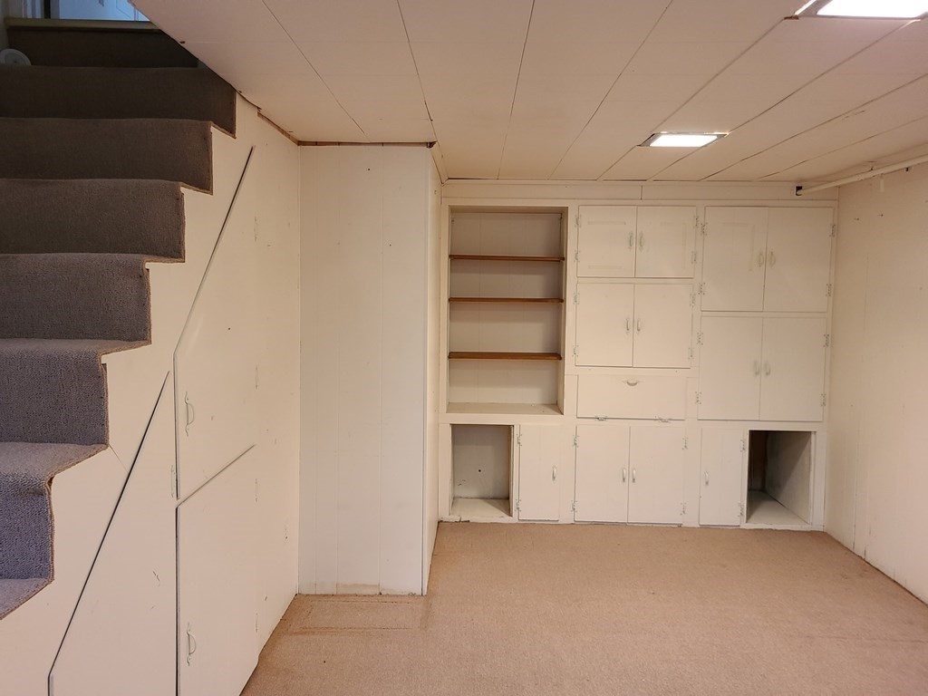 1 Lexington Circle Canton, MA 02021 - Photo 32 of 41 a view of an empty walk in closet