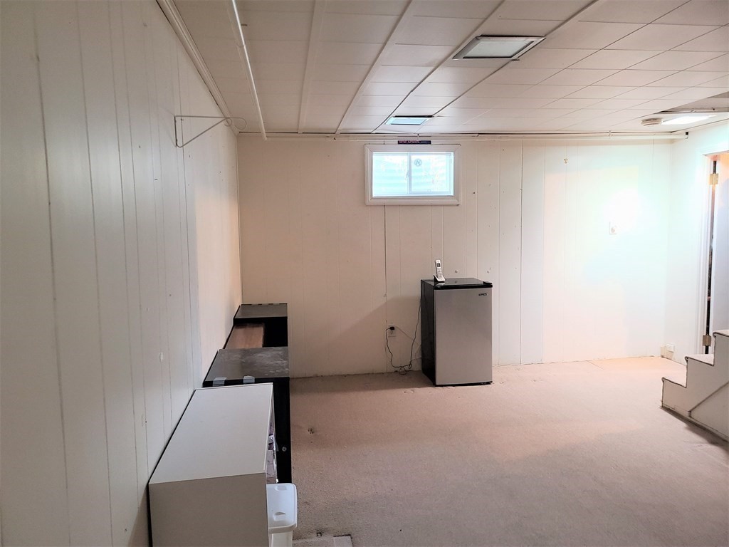 1 Lexington Circle Canton, MA 02021 - Photo 34 of 41 a room with a window and a ceiling fan