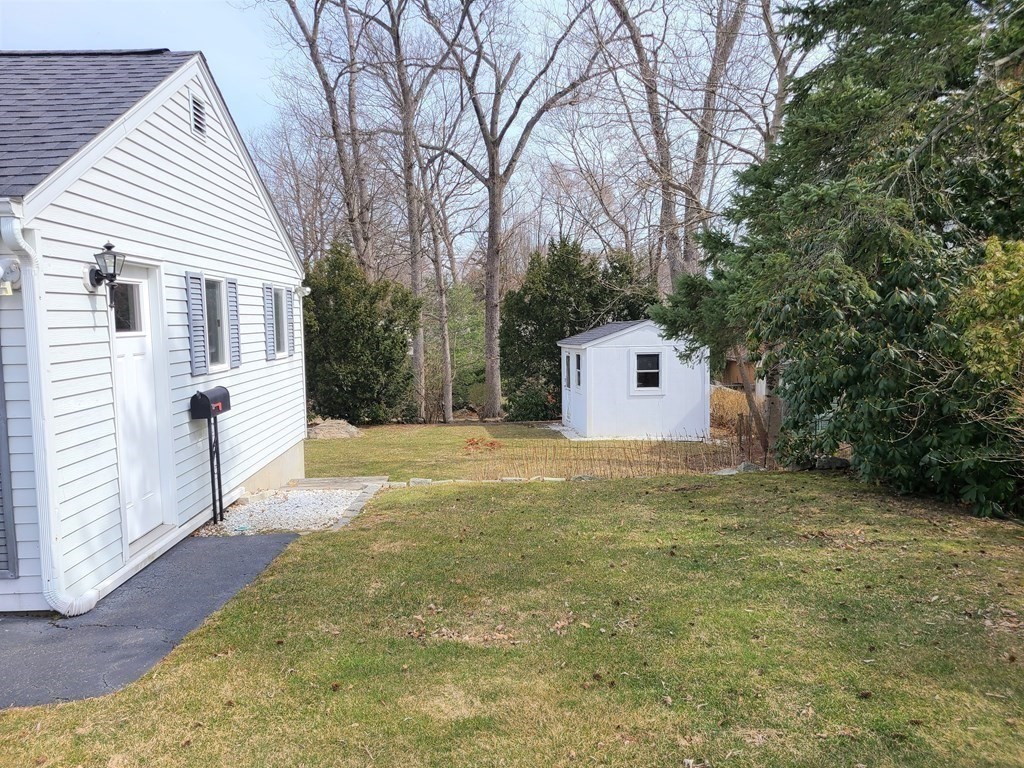 1 Lexington Circle Canton, MA 02021 - Photo 37 of 41 a bathroom with a sink and mirror