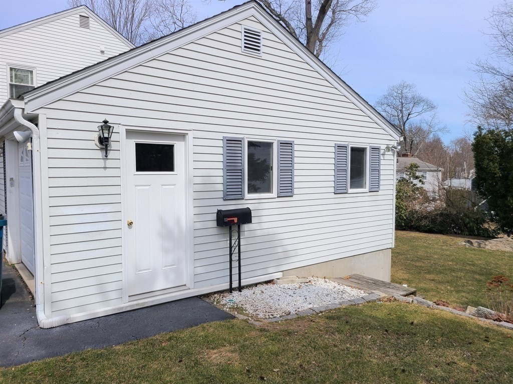 1 Lexington Circle Canton, MA 02021 - Photo 40 of 41 a view of a white house with a white door