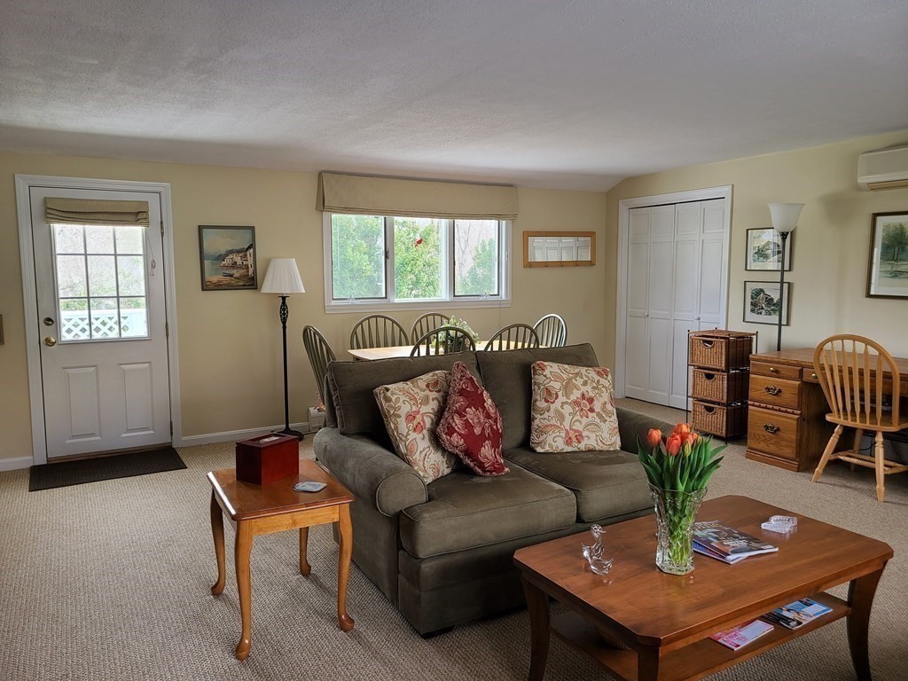 1 Lexington Circle Canton, MA 02021 - Photo 8 of 41 a living room with furniture and a large window