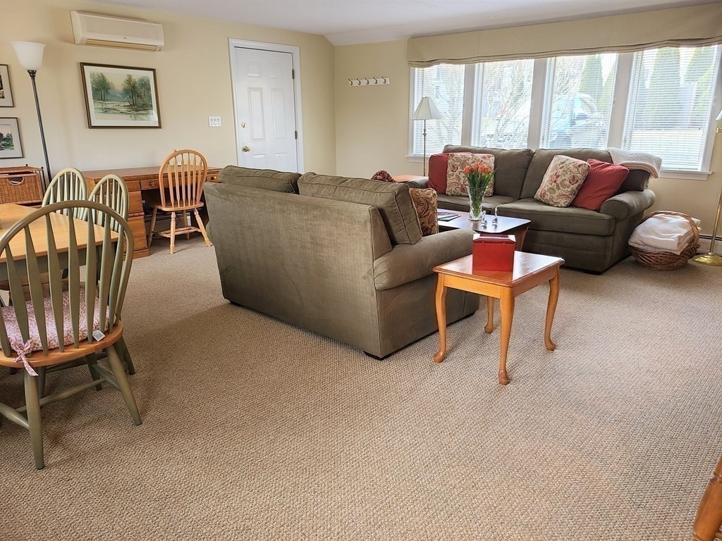 1 Lexington Circle Canton, MA 02021 - Photo 9 of 41 a living room with furniture and a window