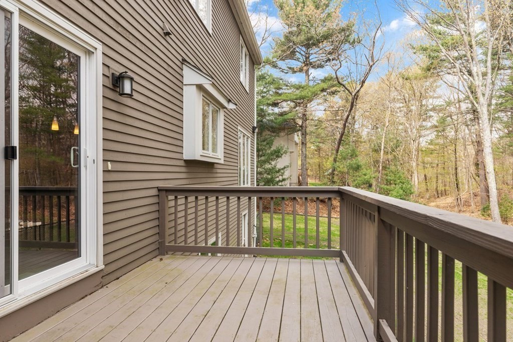 7 Wadsworth Way Sharon, MA 02067 - Photo 13 of 42 a view of a wooden deck with a yard