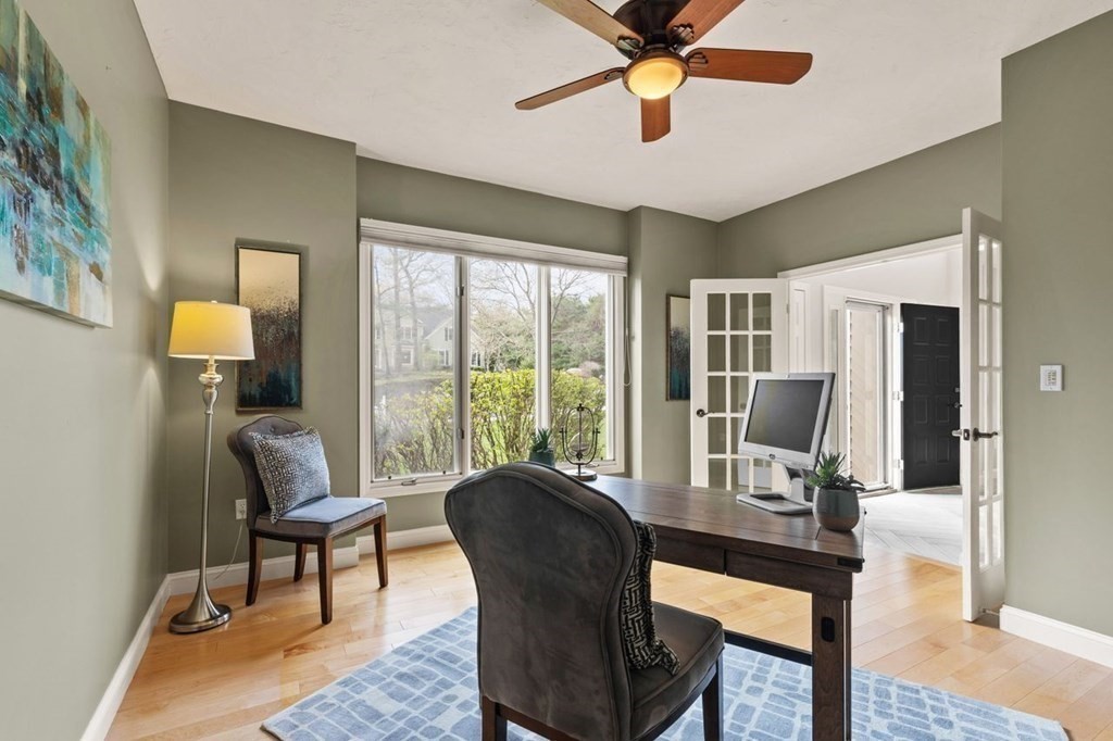 7 Wadsworth Way Sharon, MA 02067 - Photo 23 of 42 a view of a livingroom with furniture and a potted plant